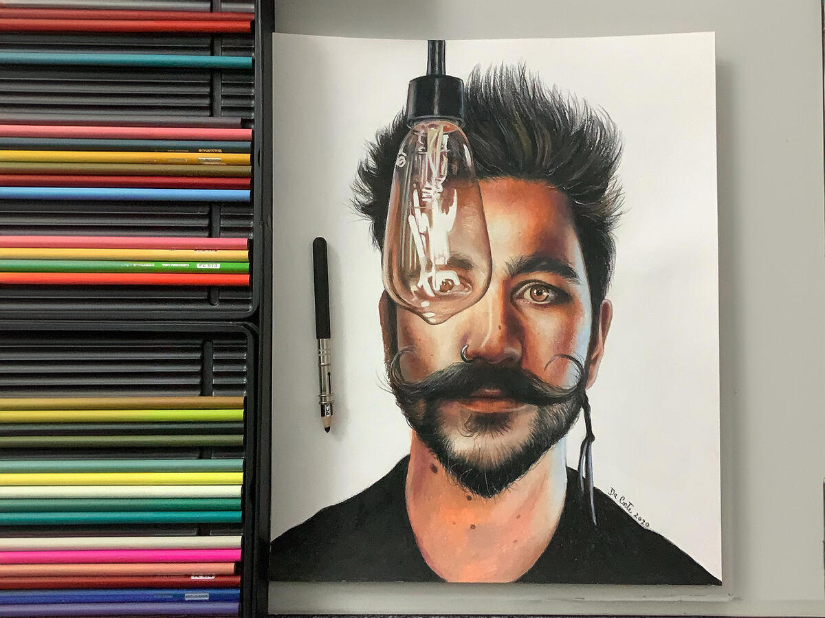 Realistic colored pencil portrait of Camilo drawn by Juan Da Corte