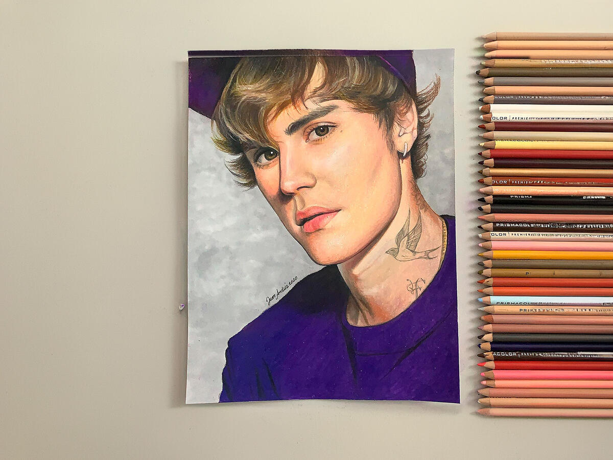 Realistic colored pencil portrait of Justin Bieber drawn by Juan Da Corte